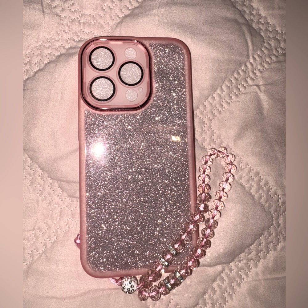 iPhone 15 pro case with charm strap and built in lens protector